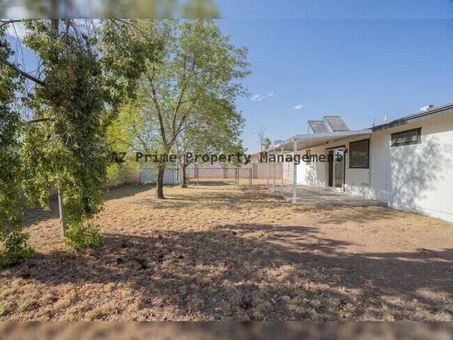 Building Photo - 3142 N 78th Dr