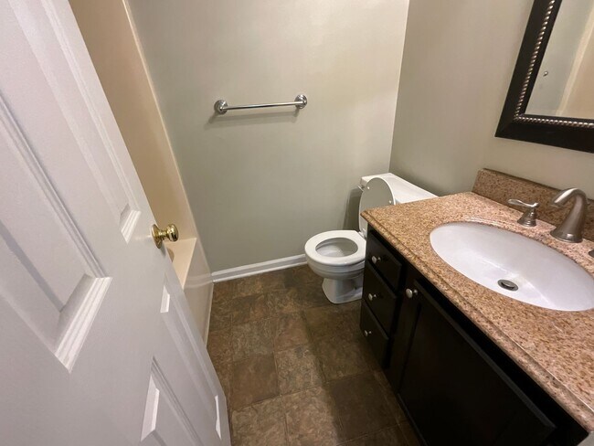 Building Photo - Now Available to View! Immaculate 2 bed, 2 bath, Fireplace, Garage, Granite and More!!