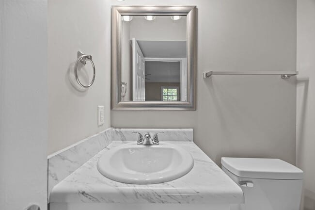 Building Photo - Charming 3-Bed Home with Granite Touches & Finished Basement in Raleigh!