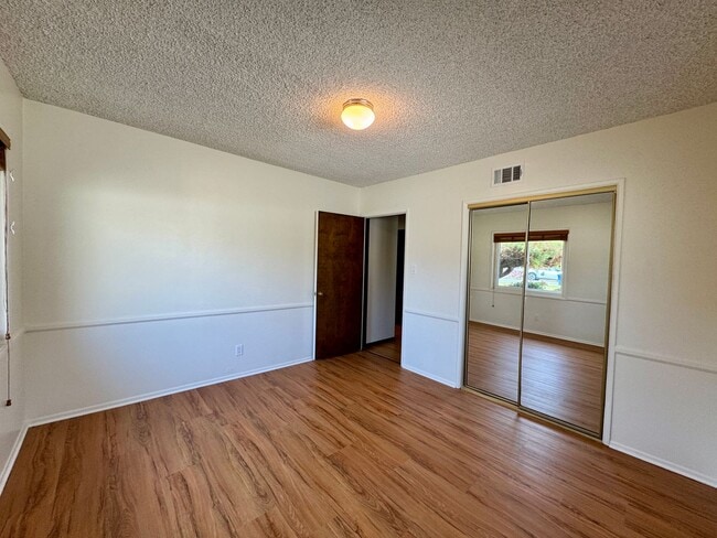 Building Photo - Charming 4-Bedroom Home on a Quiet Tree-Li...