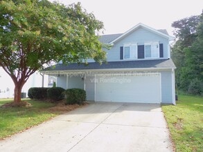Building Photo - 5402 Carriage Woods Dr