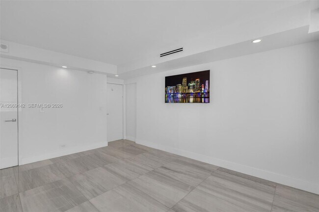 Building Photo - 5005 Collins Ave
