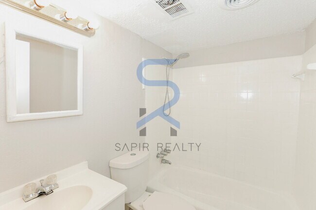 Building Photo - Move-In Ready! Freshly Updated 2BR/1.5BA with All-Electric Living