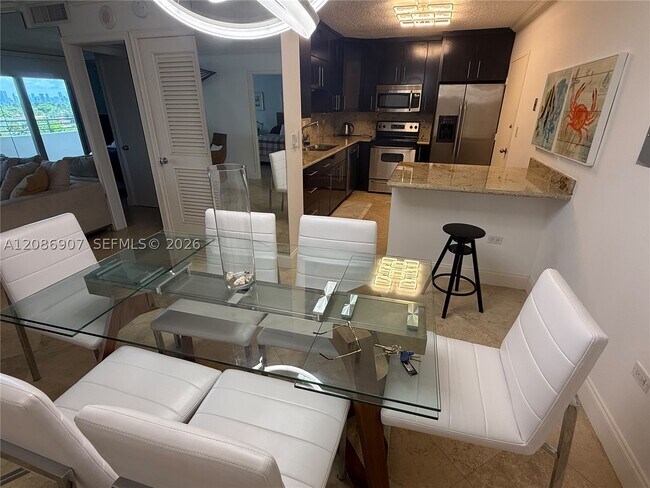 Building Photo - 5555 Collins Ave