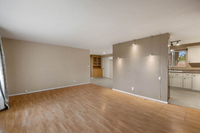 Building Photo - 4 Bedroom Home with Covered Parking & Fenced Backyard