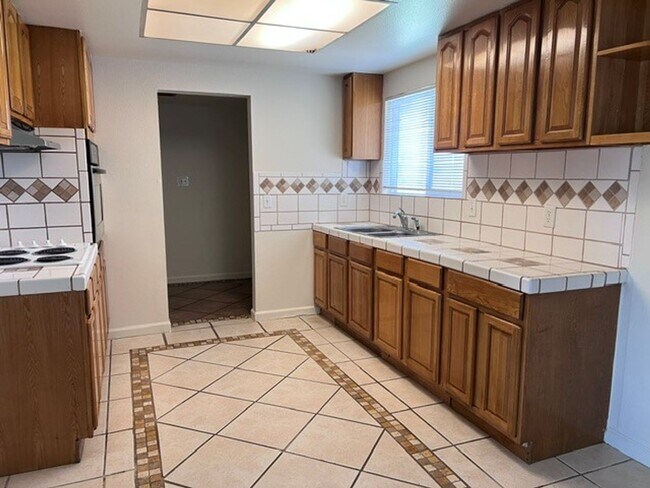 Building Photo - Freshly painted 4 bedroom home on over 2 acres of land.