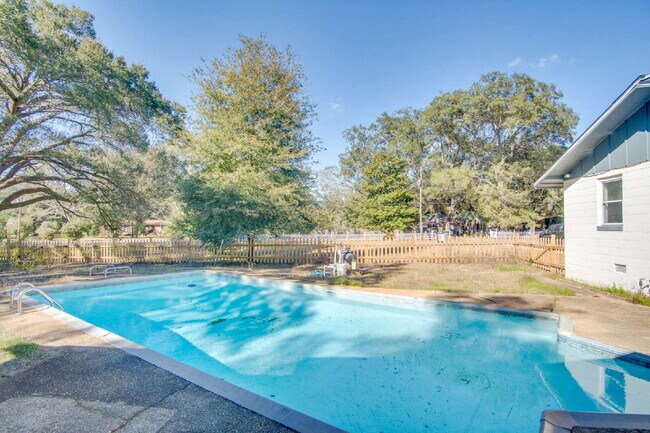 Building Photo - Stunning 4BR/2BA Pensacola Home with Private Pool, Modern Kitchen, Luxury Vinyl Flooring, Fully F...