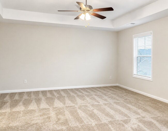 Building Photo - 4BR Home with Community Pool & Modern Finishes!