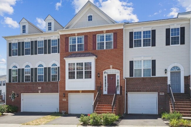 Building Photo - This beautiful townhome spans three finished levels and over 2800 square feet.