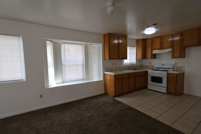 Building Photo - Spacious 3 Bedroom Duplex with Private Patio –Available! Ask About Our Move-In Special!