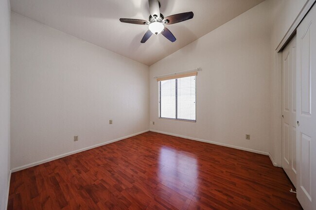 Building Photo - Welcome to this stunning 4-bedroom, 2-bath...