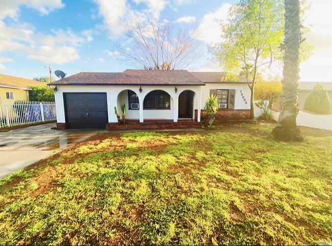 front entrance and yard - 14032 Stagg St