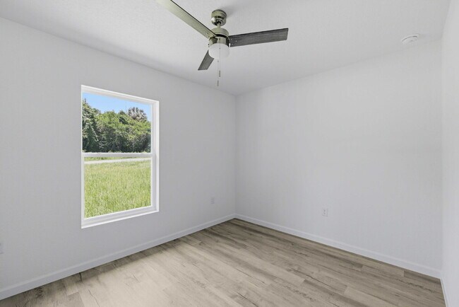 Building Photo - Available Now! New 3/2 Home with Large Backyard and Front Porch