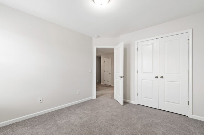 Building Photo - Stylish 4-Bedroom Townhome with Backyard O...