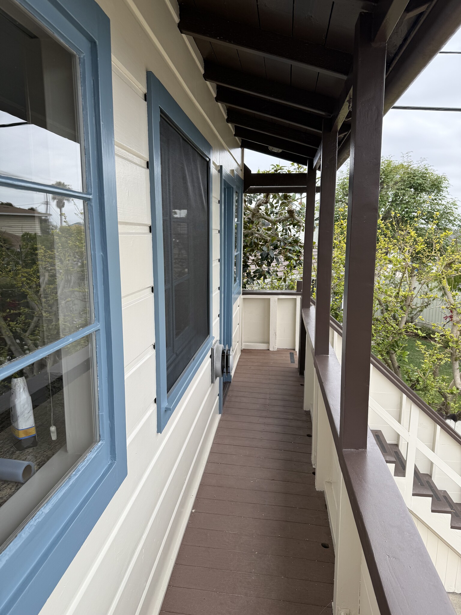 front balcony and stairs - 8252 Rees St
