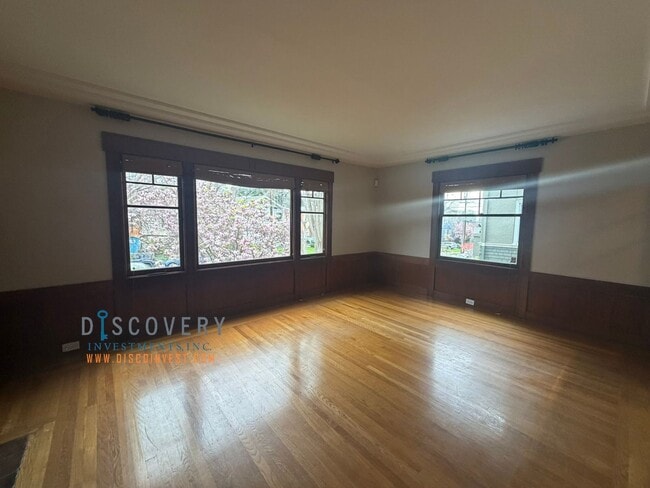 Building Photo - Lakeshore Craftsman with Detached Cottage and Versatile Bonus Rooms