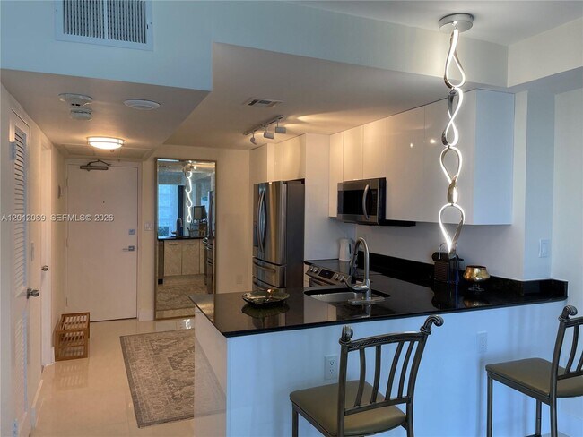 Building Photo - 10275 Collins Ave