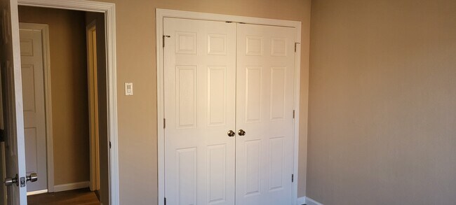 one of the rooms closet, new doors - 10001 kodiak Dr