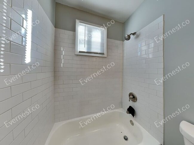 Building Photo - Charming 2BR Duplex with Modern Comfort an...