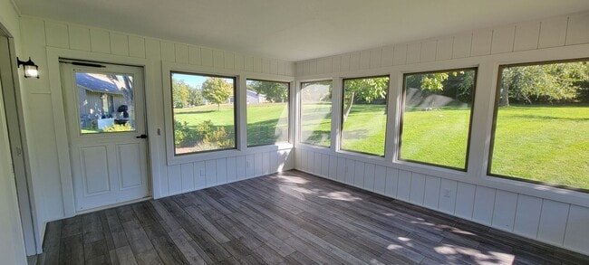 Building Photo - Beautiful home with peek a boo views of West Bay on Old Mission Peninsula