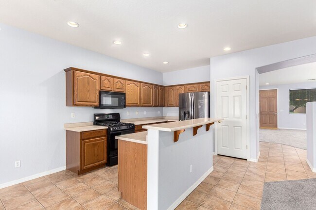 Building Photo - Coming Soon! Spacious Home & Yard with RV ...