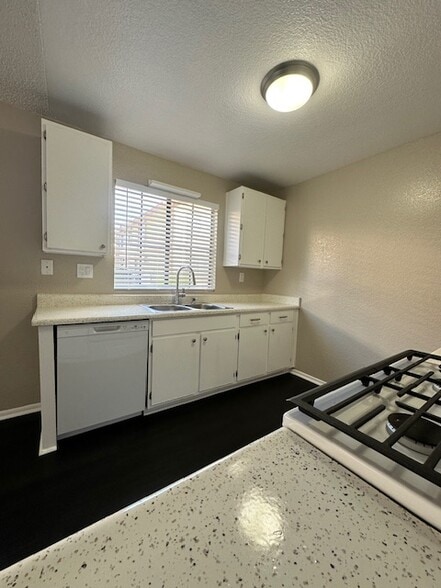 Dishwasher and range. Fridge provided upon request - 7385 Lariat Pl