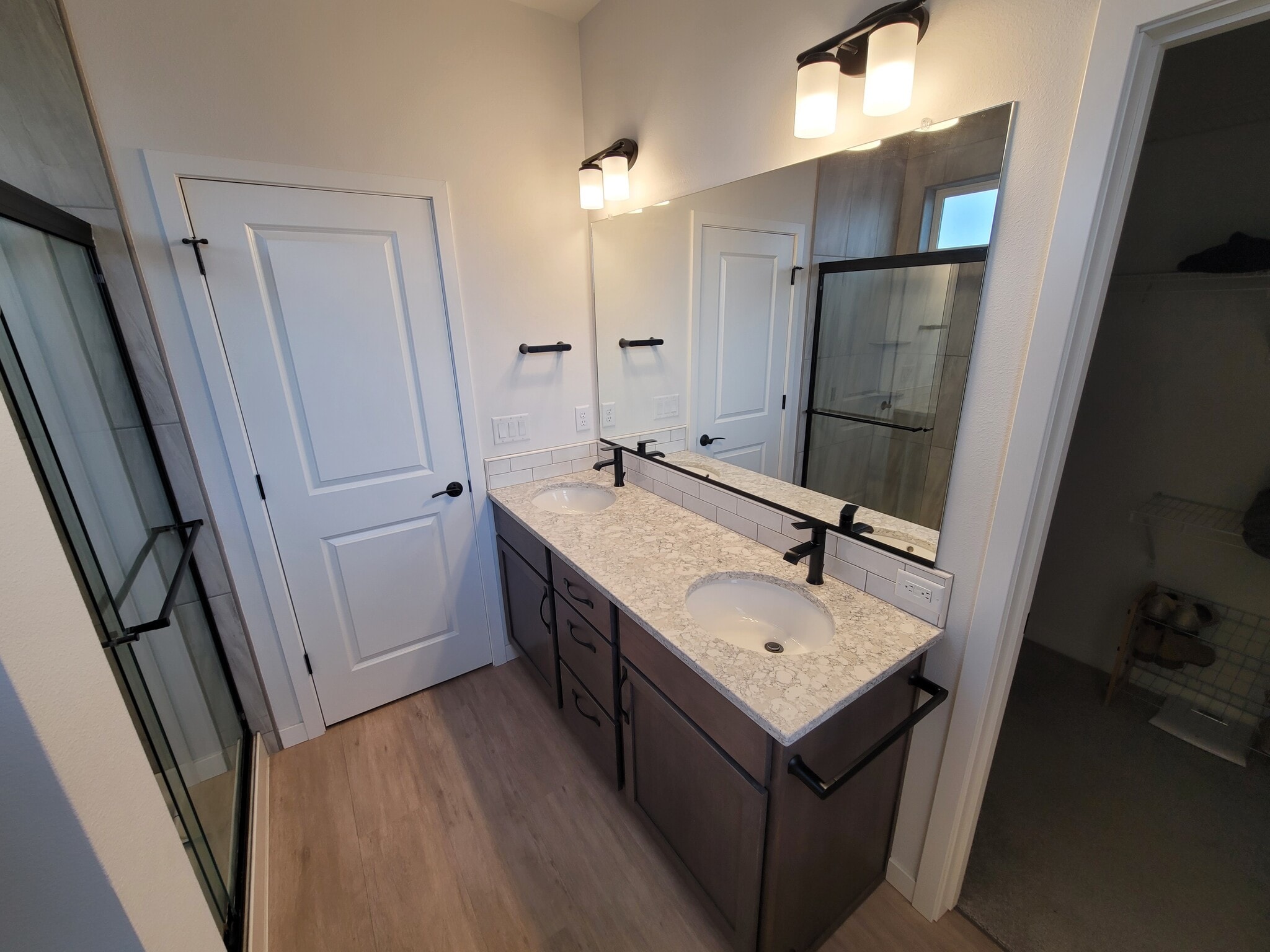 Master bath double vanity and shower with access to walking closet. - 1869 N Skagit Dr