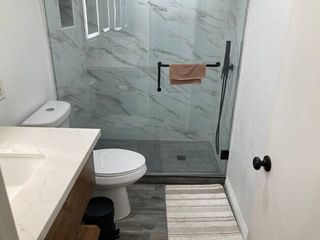 Building Photo - Beachside Furnished Retreat! Remodeled 2BD/2BA Condo Steps from the Sand!
