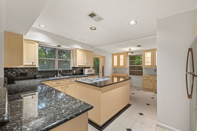 Building Photo - Charming Home with Expansive Backyard on a...
