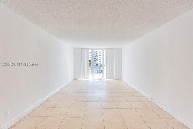 Building Photo - 19380 Collins Ave
