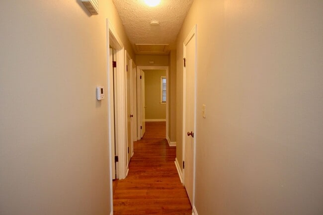 Building Photo - Adorable 3-brm brick ranch with lots of natural light, family room/den, attached garage