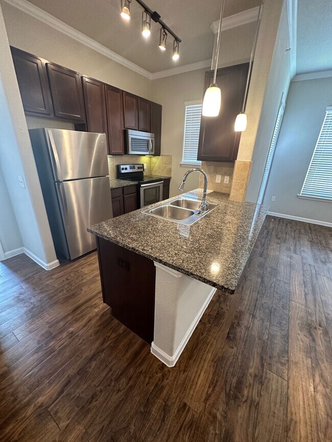 Building Photo - 27040 U.S. 380 Apt #106, Aubrey, TX 76227 - 1 BR 1 BA Condo