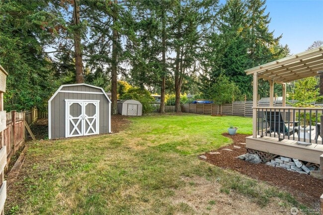 Building Photo - Classic Mid-Century Rambler with Modern Co...