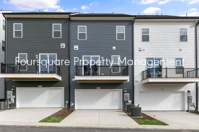 Building Photo - Spacious Townhome with Entry-Level Guest Suite, Washer/ Dryer Included, 2nd floor Balcony & 2-Car...