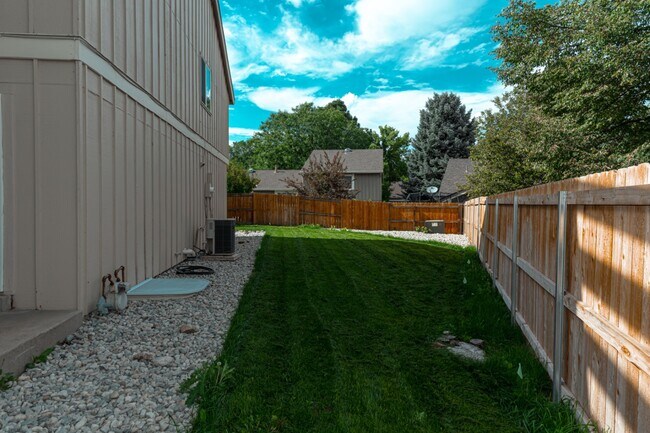 Building Photo - 7355 S Garfield Ct