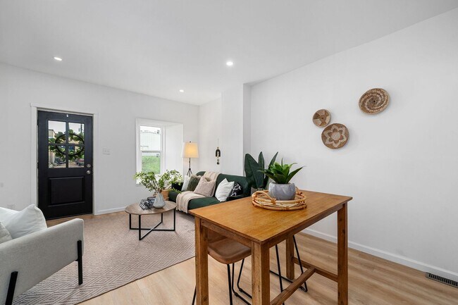 Building Photo - $1795 - Single Family Home with Private Two-Level Living Spaces, Driveway Parking & Modern Updates