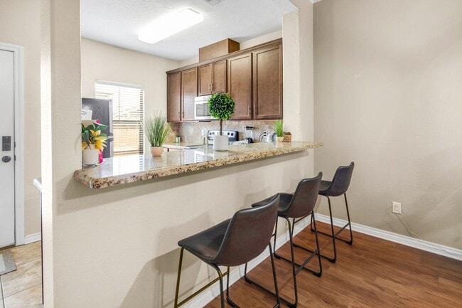 Building Photo - AUGUST PRE-LEASE Spacious 3 Bedroom 2.5 Bathroom Townhome with Covered Parking