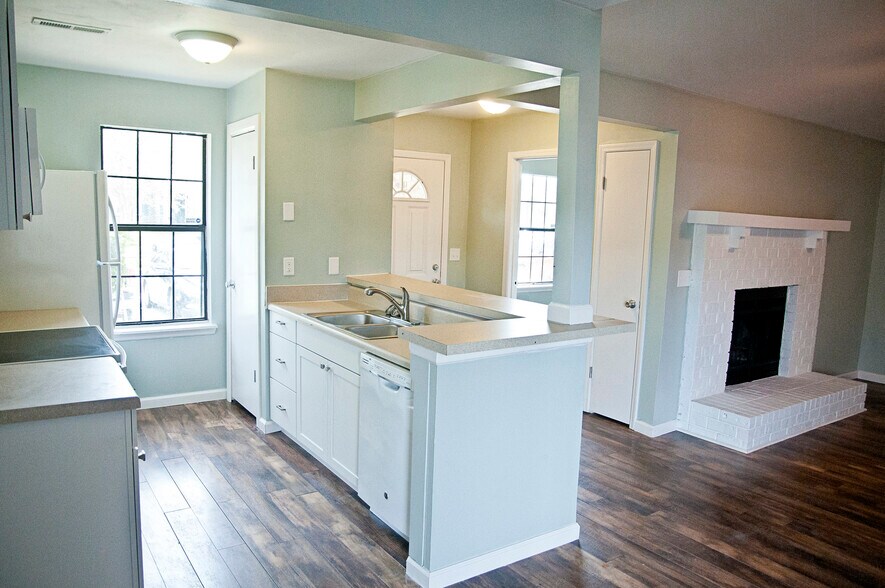 Kitchen and living room from the breakfast nook. - 409 Erskine St