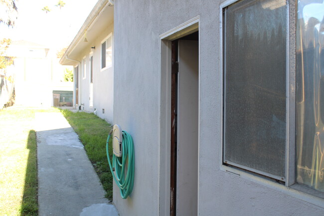 side yard and back garage door - 408 Pine St