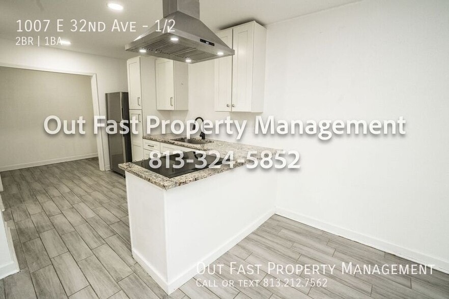 Building Photo - 1007 E 32nd Ave