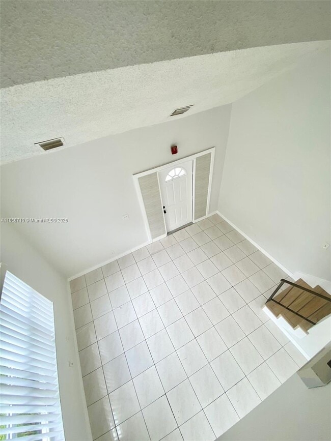 Building Photo - 3200 Coral Springs Dr