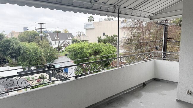 Huge private balcony on top floor corner unit - 7617 De Longpre Ave