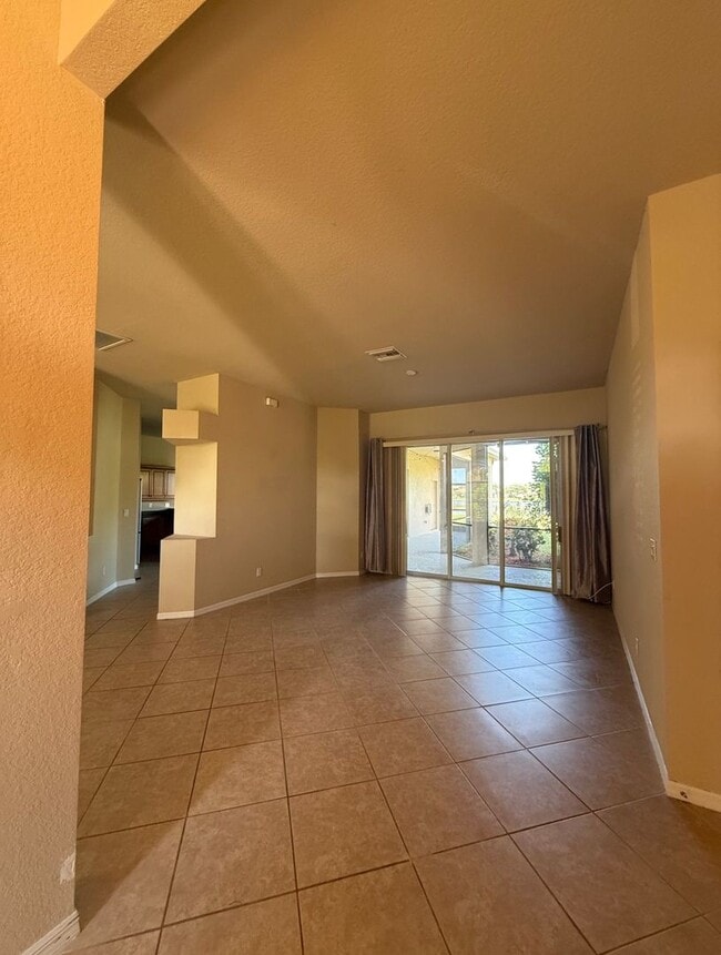 Building Photo - 4 Bedroom, 3 Bath Lakefront Home with 3-Car Garage in Stoneybrook at Gateway