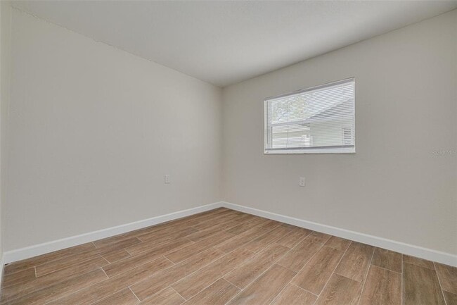 Building Photo - 7116-7120 Oakwood Dr