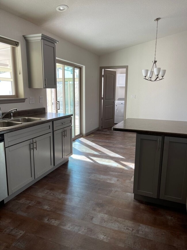 Building Photo - 3 Bedroom 2 Bath With a 2 car garage