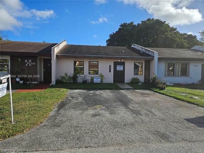 Building Photo - 5317 SW 140th Pl