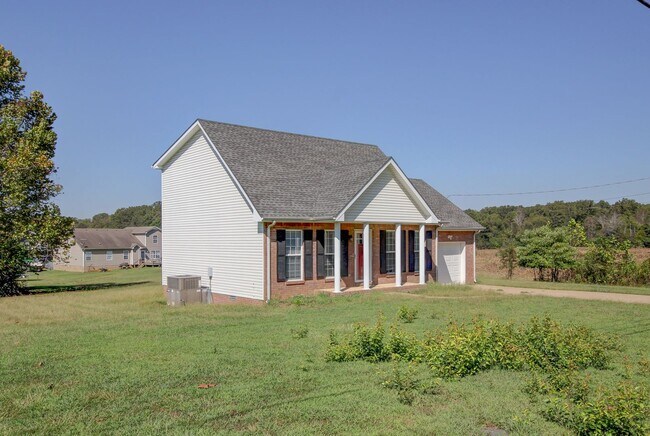 Building Photo - Country living.  City Driving.