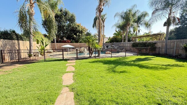 Building Photo - 3 Bedroom, 2 Bathroom Home with Pool locat...