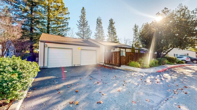 Building Photo - Cozy 1 bedroom 1 bath end unit condo with 1 car garage and private patio located next to Peterson...