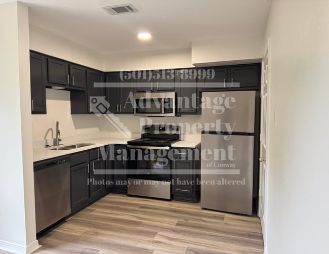 Building Photo - Showings Available!